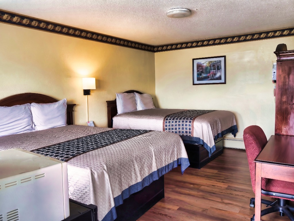 Double queen bed motel room at Delta Motel