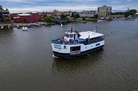 Excursion boat cruise on the Saginaw River Bay City Michigan sunset